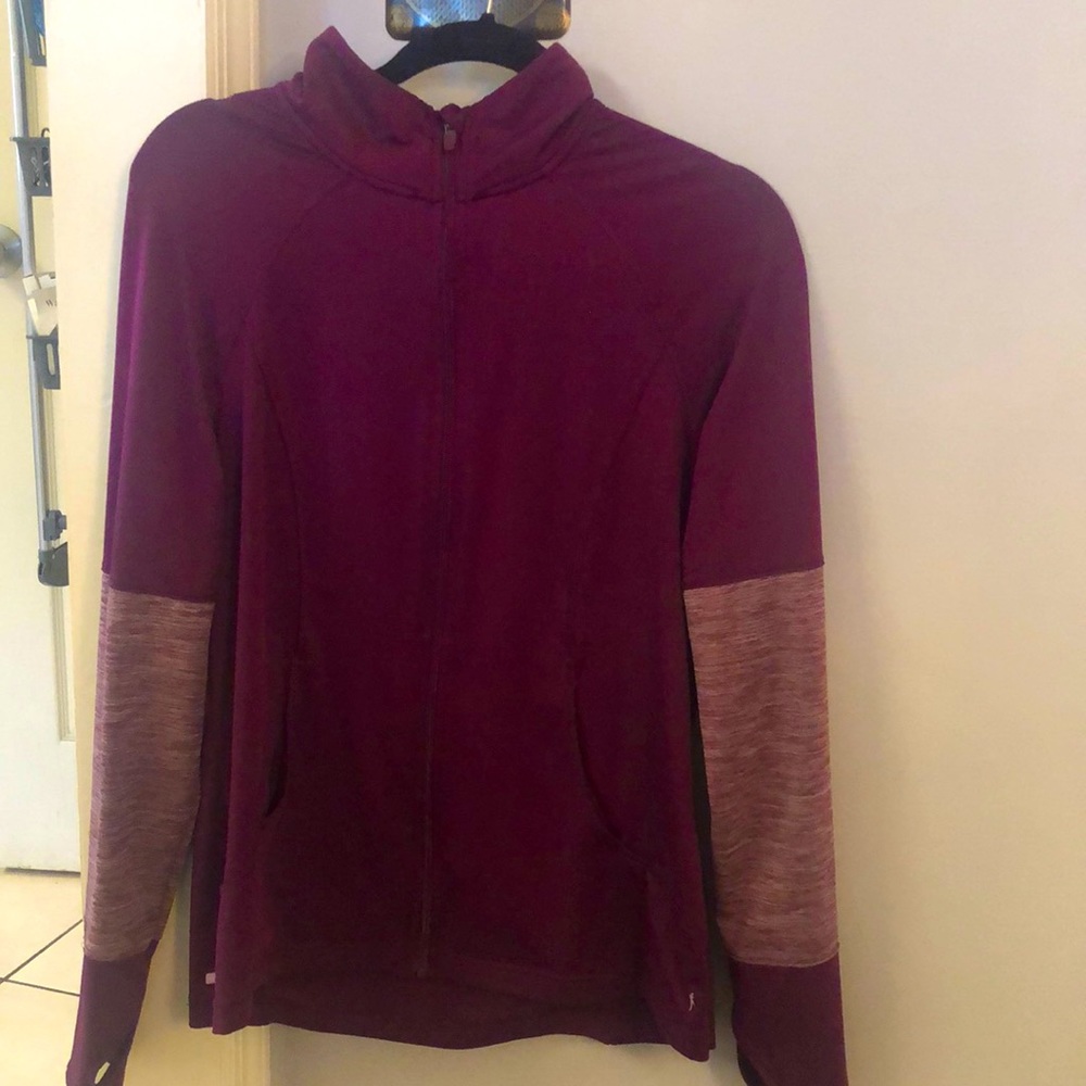 Danskin NOW  semi fitted poly spandex zip up jacket. Rear reflector strip, L